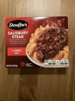 Salisbury Steak Roasted Patty Made With Beef Topped With Onions & Gravy With Macaroni & Cheese