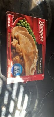 Turkey With Gravy And Dressing, Creamy Mashed Potatoes And Sweet Peas Meal