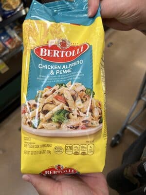 Penne With Grilled White Meat Chicken, Broccoli, Portabella Mushrooms And Juicy Tomatoes In A Creamy Alfredo Sauce