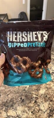 Bite Size Pretzels Dipped in Milk Chocolate and Drizzled with Dark Chocolate