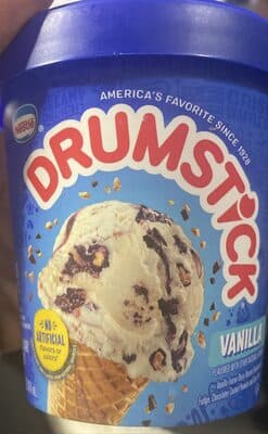 Vanilla Ice Cream Swirled With Fudge, Chocolatey Coated Peanuts And Cone Pieces