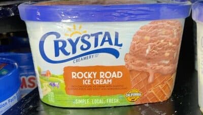 Rocky Road Rich Chocolate Ice Cream With Roasted Almond Pieces And Sweet Mini Marshmallows