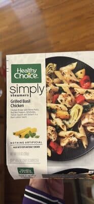 Grilled Basil Chicken Breast With Penne Pasta, Artichokes, Red Bell Peppers, Yellow Squash And Spinach In A Basil Lemon Sauce