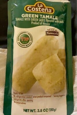 Green Tamale With Green Sauce Flavored With Pork