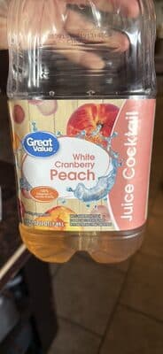 White Cranberry Peach Flavored Juice Cocktail Blended With Another Juice From Concentrate