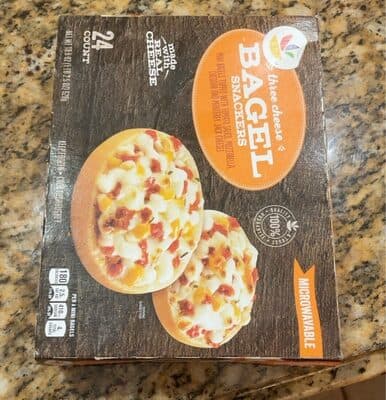 Three Cheese Mini Bagels Topped With Tomato Sauce, Mozzarella, Cheddar And Monterey Jack Cheeses Snackers