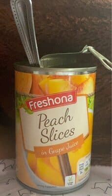 Peach slices in grape juice
