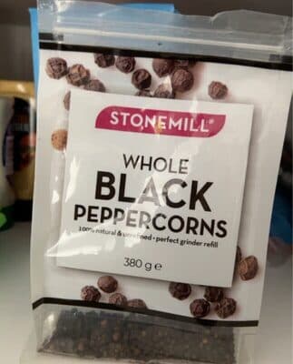 Whole black peppercorns