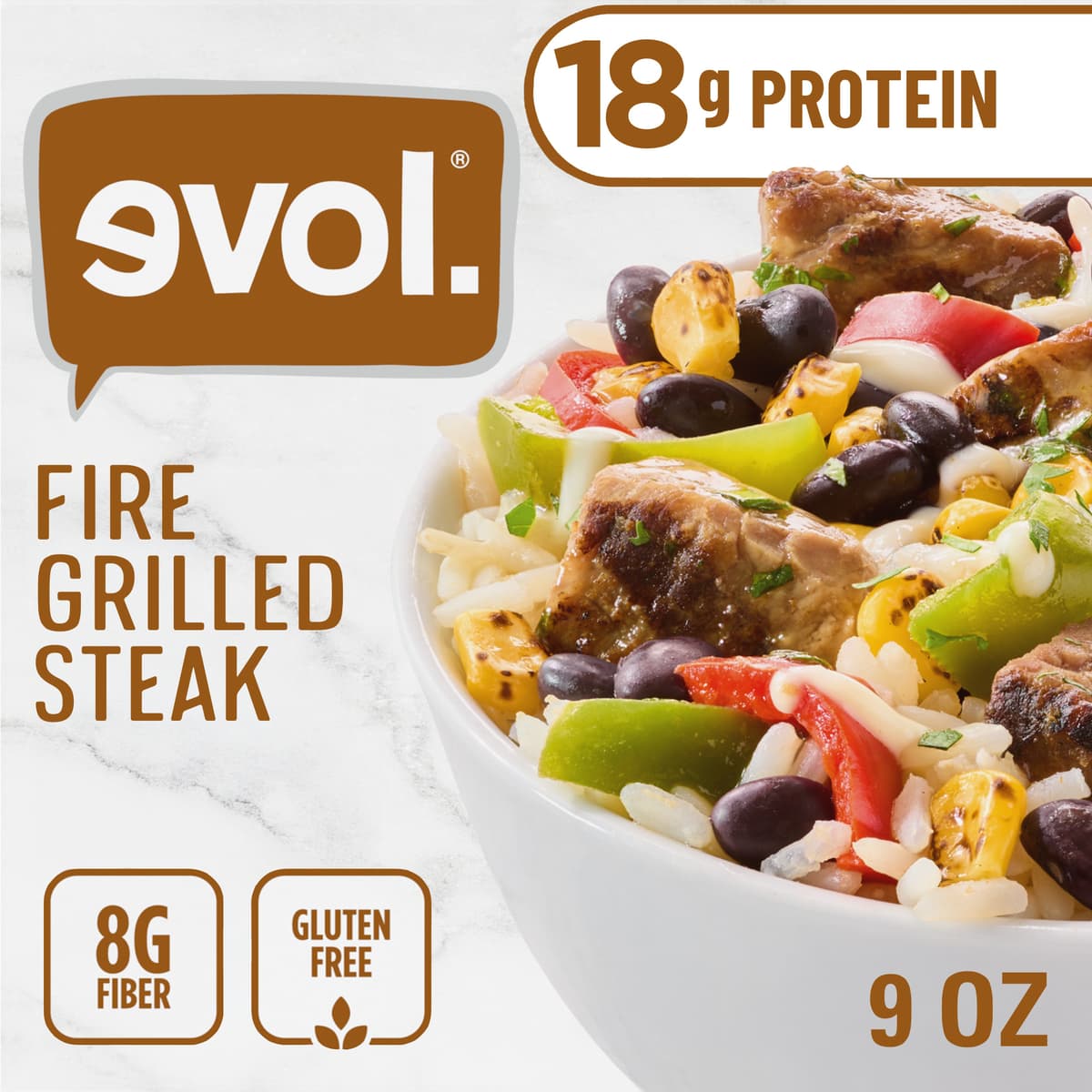 Fire Grilled Steak With Black Beans, White Rice, Red & Green Bell Peppers, Roasted Corn And Cheddar Cheese All Topped With An Insanely Tasty Cilantro Lime Pesto