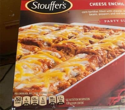 Cheese Enchiladas Corn Tortillas Filled With Cheese, Topped With Tangy Enchilada Sauce & Served Over Rice & Beans