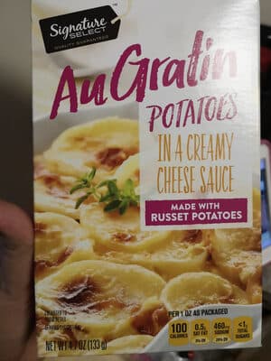Augratin Potatoes In A Creamy Cheese Sauce Made With Russet Potatoes