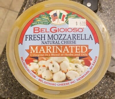 Fresh Mozzarella Marinated in a Blend of Herbs and Oils