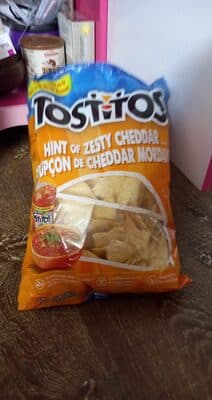Tostitos chips hint of zesty cheddar