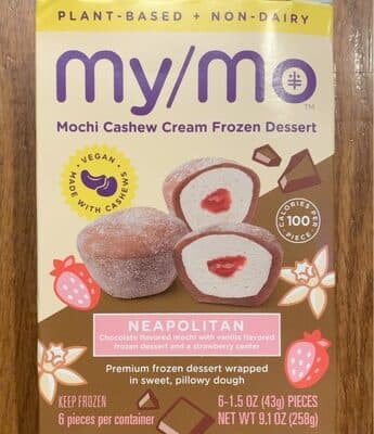 Neapolitan Chocolate Flavored Mochi With Vanilla Flavored Frozen Dessert And A Strawberry Center Premium Frozen Dessert Wrapped In Sweet, Pillowy Dough