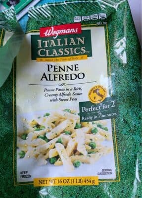 Penne Pasta In A Rich, Creamy Alfredo Sauce With Sweet Peas