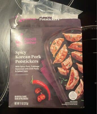 Spicy Korean Pork Potstickers With Spicy Pork, Cabbage Seasoned With Chili Paste & Salted Sake