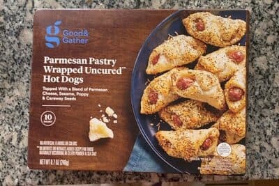 Parmesan Pastry Wrapped Uncured Hot Dogs Topped With A Blend Of Parmesan Cheese, Sesame, Poppy & Caraway Seeds