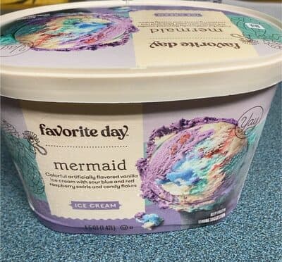 Mermaid Colorful Artificially Flavored Vanilla Ice Cream With Sour Blue And Red Raspberry Swirls And Candy Flakes
