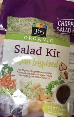ASIAN INSPIRED SALAD KIT WITH ORGANIC CHOPPED GREEN CABBAGE, CARROTS, CELERY, CILANTRO, GREEN ONION, WONTON STRIPS AND SLICED ALMONDS
