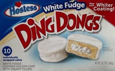 White Fudge Covered Golden Cake With Creamy Filling