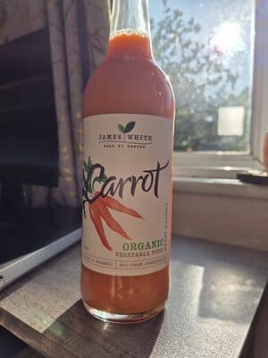 James White Drinks Organic Carrot Juice